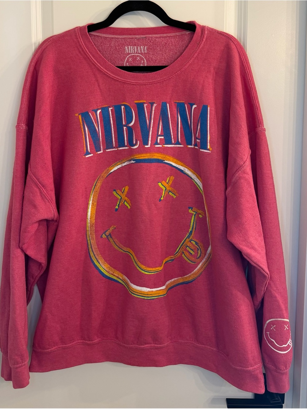 NIRVANA Coral Pink Smiley Graphic Crewneck